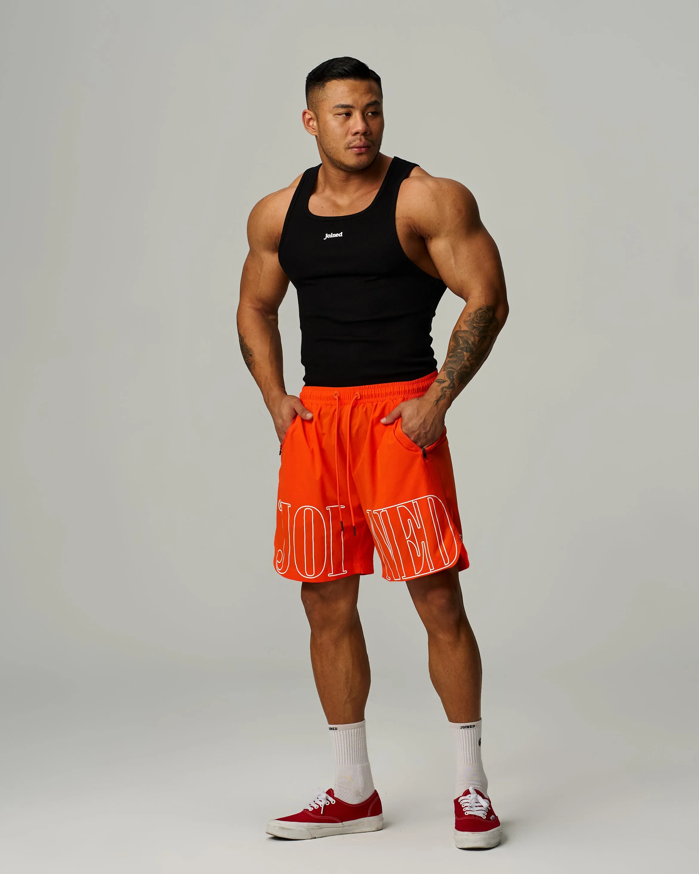 Quad Logo Side Slit Stretch Shorts